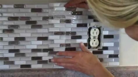 how to cut out electrical boxes in ceramic tile|tile around kitchen outlets.